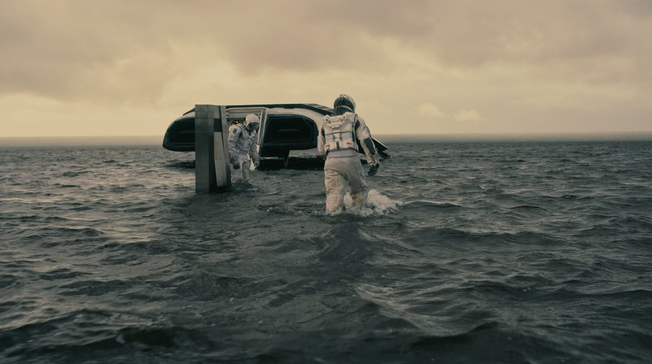 Brand, TARS, and Doyle on Miller's Planet